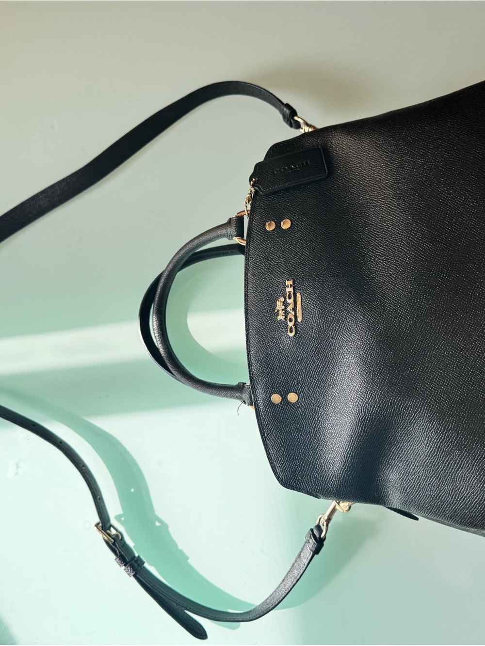 COACH Black Leather Satchel with Gold Accents